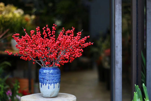 Prosperity in Red: Chinese New Year Holly Arrangements